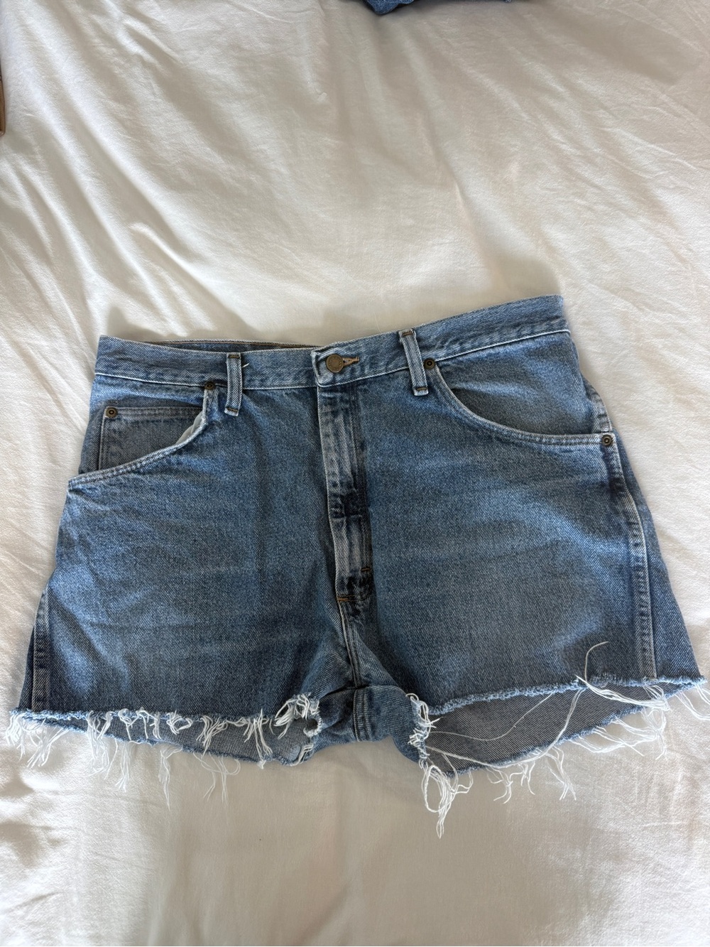 Wrangler Light Blue Cutoff Denim Shorts with Frayed Hem